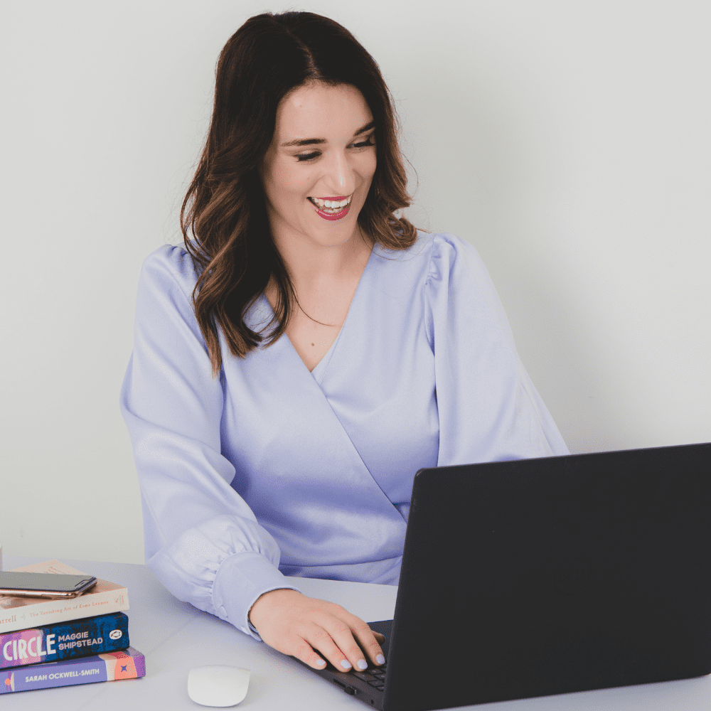 Freelance copywriter Zoe Barnett on laptop